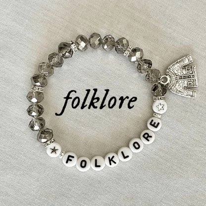 Bracelet with 'folklore' beads on a light gray background