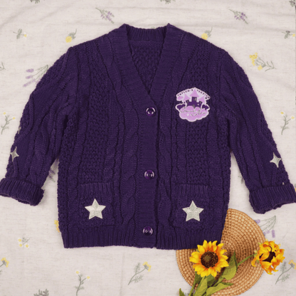 Purple cardigan with star designs on a floral background