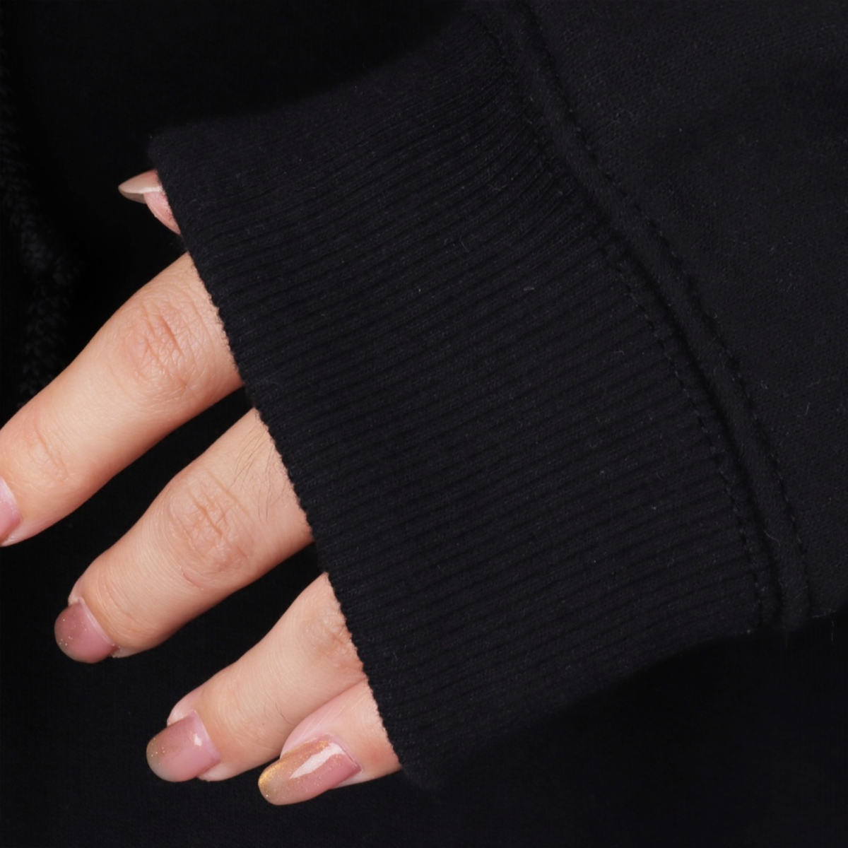Taylors Reputation Hoodie - Black eras knit hoodie folded showing embroidery
